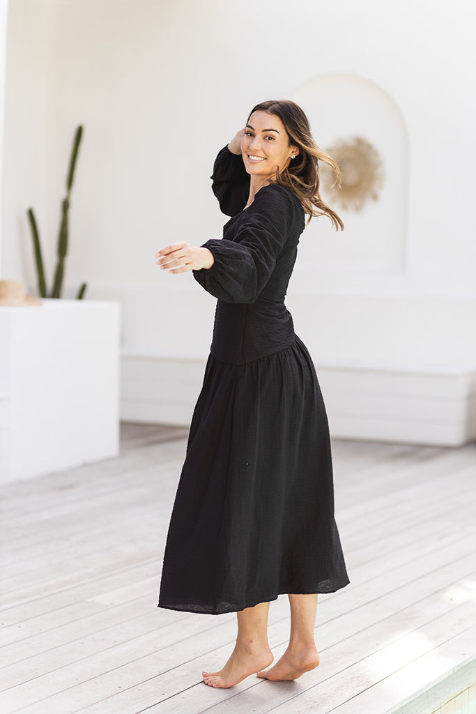 Long sleeved black maxi dress with asymmetric neckline and cut out | LOVLEA Boutique Australia